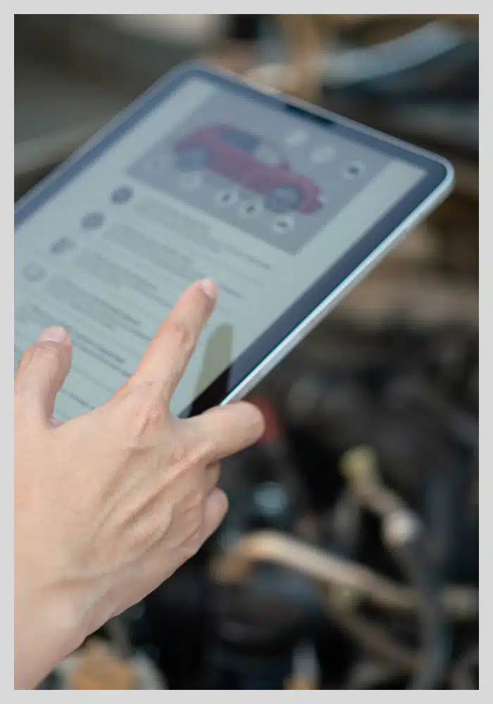 a technician on a tablet doing a digital inspection