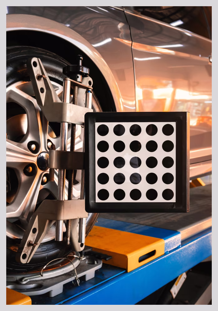 A car undergoing an alignment service